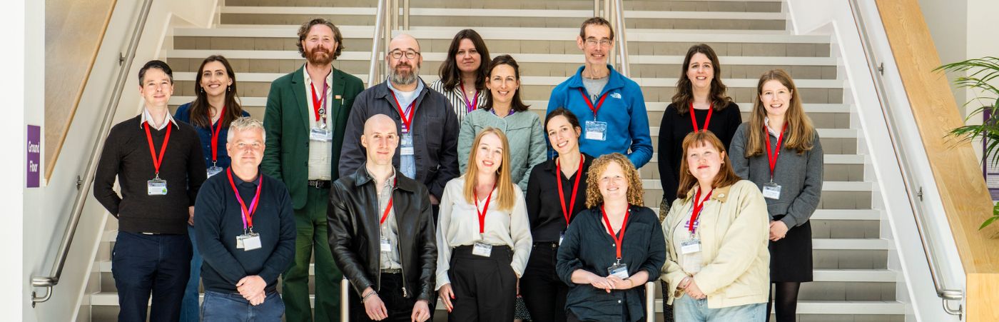 Members of the Research Services team on the stairs in AMBS